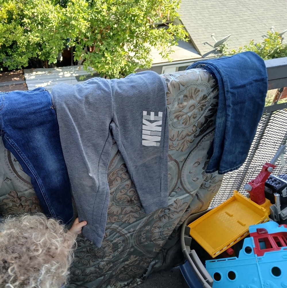 22 pair of pants all name brand mixed
